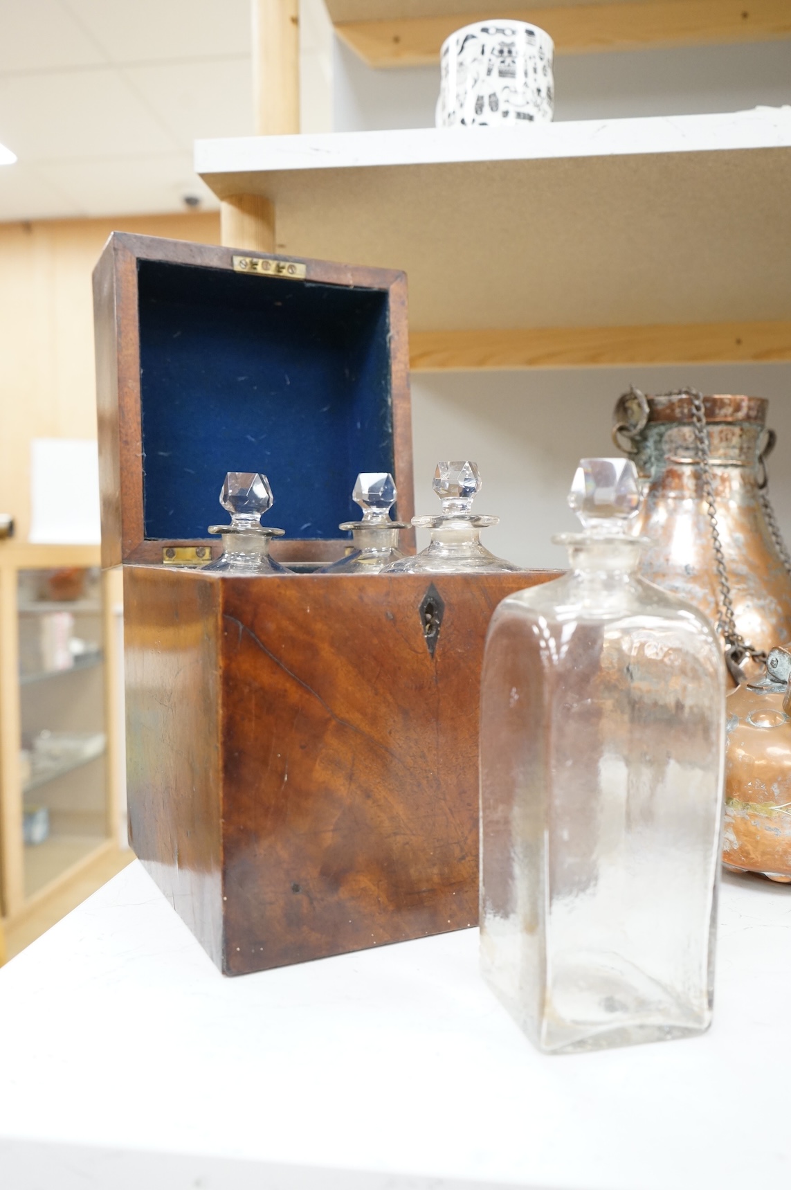 A George III mahogany four bottle decanter box, 26cm